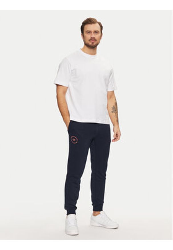 Jack & Jones - Jack&Jones Spodnie dresowe Gordon 12268442 Granatowy Regular Fit. Kolor: niebieski. Materiał: bawełna, syntetyk