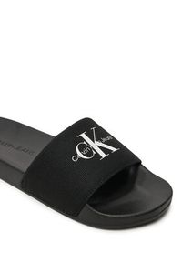 Calvin Klein Jeans Klapki Slide Monogram Wn YW0YW01835 Czarny. Kolor: czarny. Materiał: materiał #6