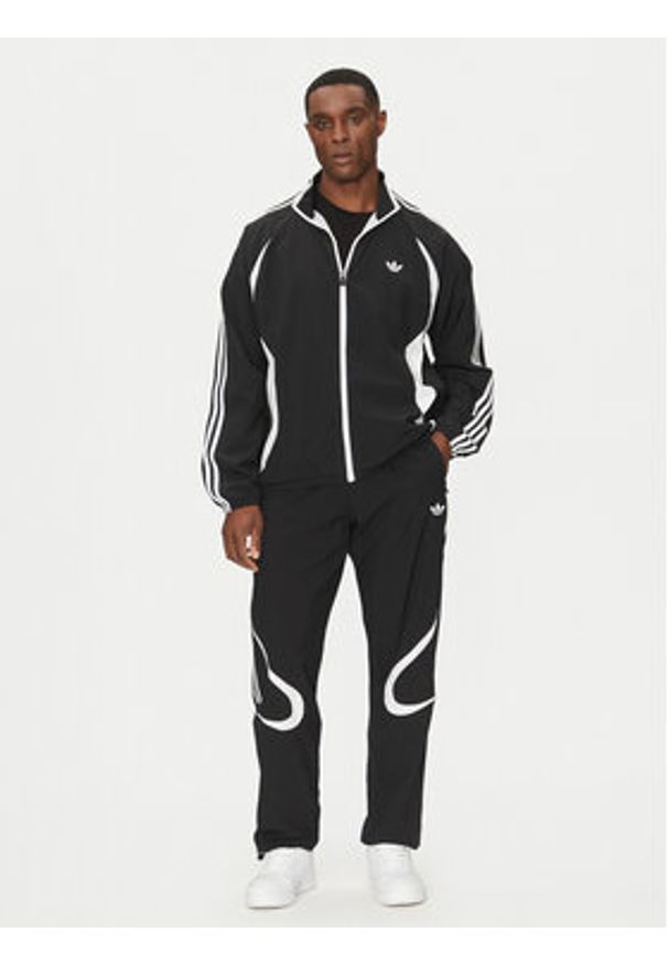 Adidas - adidas Spodnie dresowe adicolor Teamgeist JC6228 Czarny Regular Fit. Kolor: czarny. Materiał: syntetyk
