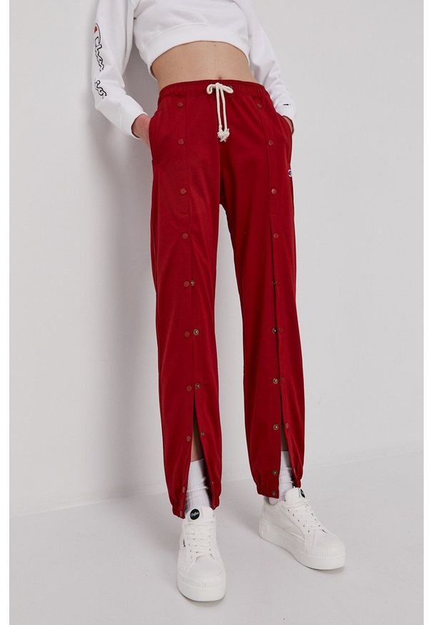 Champion Spodnie 112311 damskie kolor bordowy gładkie. Kolor: czerwony. Wzór: gładki