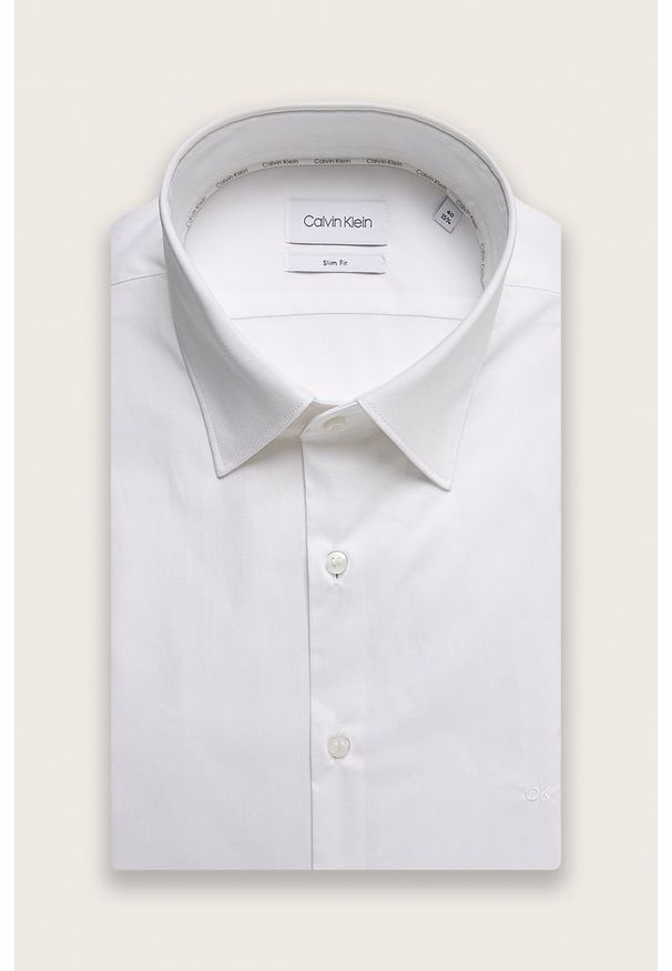 Calvin Klein - Koszula. Typ kołnierza: kołnierzyk klasyczny. Kolor: biały. Materiał: tkanina, bawełna, poliamid, elastan. Długość: długie. Styl: elegancki, klasyczny