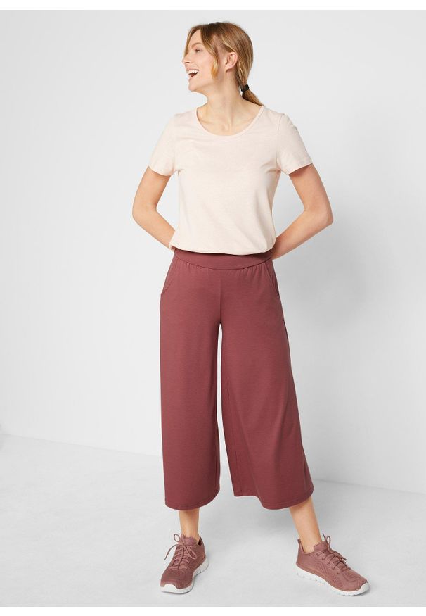bonprix - Wygodne spodnie culotte z szeroką nogawką. Kolor: fioletowy. Materiał: materiał. Styl: klasyczny, sportowy
