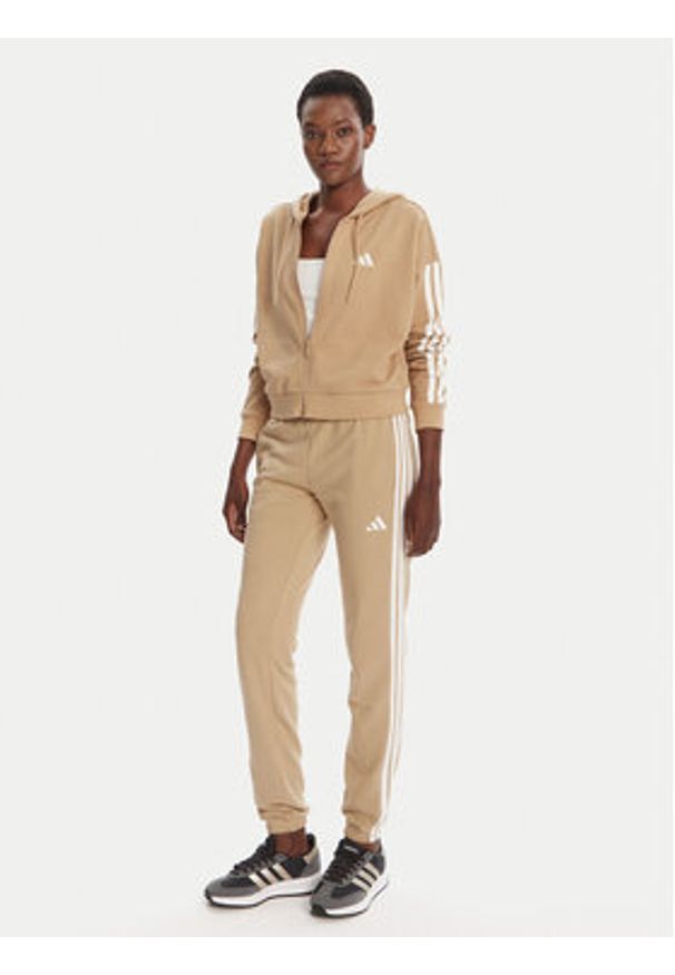 Adidas - adidas Spodnie dresowe Essentials 3-Stripes JX7661 Beżowy Regular Fit. Kolor: beżowy. Materiał: bawełna