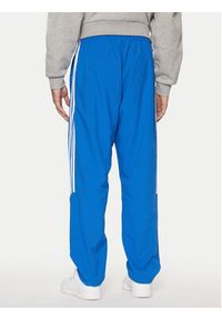 Adidas - adidas Spodnie dresowe adicolor Teamgeist JP1120 Niebieski Regular Fit. Kolor: niebieski. Materiał: syntetyk #4