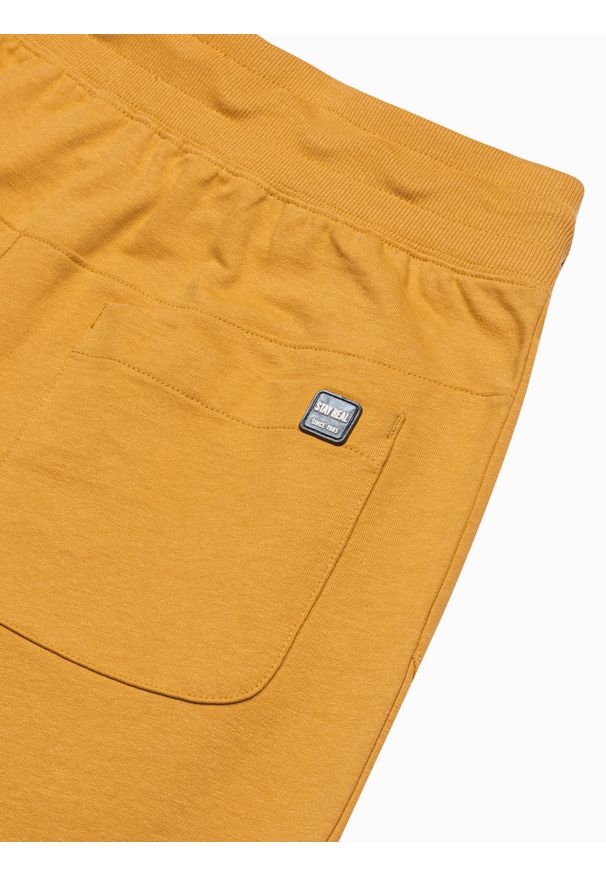 Żółte spodnie Ombre Clothing