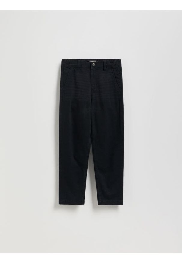 Reserved - Jeansy Carrot - czarny. Kolor: czarny