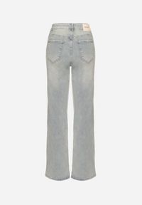 Born2be - Jasnoniebieskie Jeansy o Szerokim Kroju z Wysokim Stanem Lanarion. Okazja: na co dzień. Stan: podwyższony. Kolor: niebieski. Wzór: gładki, aplikacja. Styl: casual #5