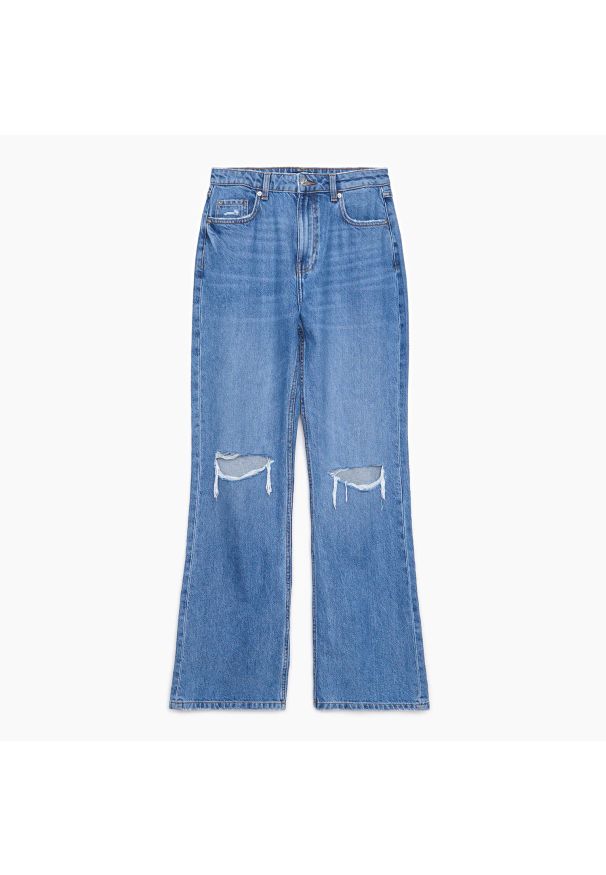 Cropp - Niebieskie jeansy flare z dziurami - Niebieski. Kolor: niebieski