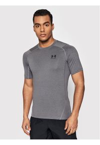 Under Armour Koszulka techniczna HeatGear® 1361518 Szary Slim Fit. Kolor: szary. Materiał: syntetyk