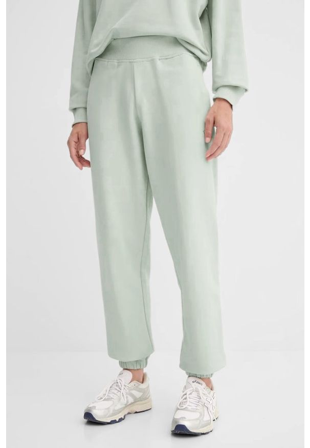 Guess - GUESS Zielone spodnie dresowe damskie Primula, Rozmiar S. Kolor: zielony. Materiał: dresówka