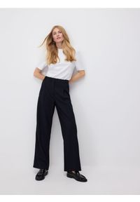 Reserved - Spodnie z kantem - wielobarwny. Materiał: wiskoza, tkanina #1