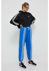 adidas Originals spodnie dresowe bawełniane kolor niebieski z aplikacją. Stan: podwyższony. Kolor: niebieski. Materiał: bawełna, dresówka. Wzór: aplikacja #1