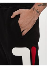 Fila Spodnie dresowe FAU0069 Czarny Regular Fit. Kolor: czarny. Materiał: bawełna, dresówka #7