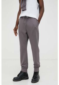 G-Star RAW - G-Star Raw spodnie dresowe kolor fioletowy gładkie. Kolor: fioletowy. Materiał: dresówka. Wzór: gładki