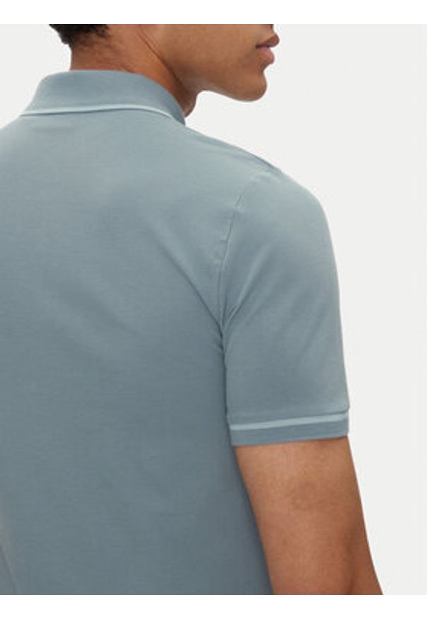 Calvin Klein Jeans Polo J30J315603 Niebieski Slim Fit. Typ kołnierza: polo. Kolor: niebieski. Materiał: bawełna