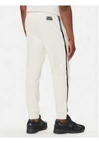 EA7 Emporio Armani Spodnie dresowe 7M000974 AF10377 U1105 Beżowy Regular Fit. Kolor: beżowy. Materiał: bawełna #4
