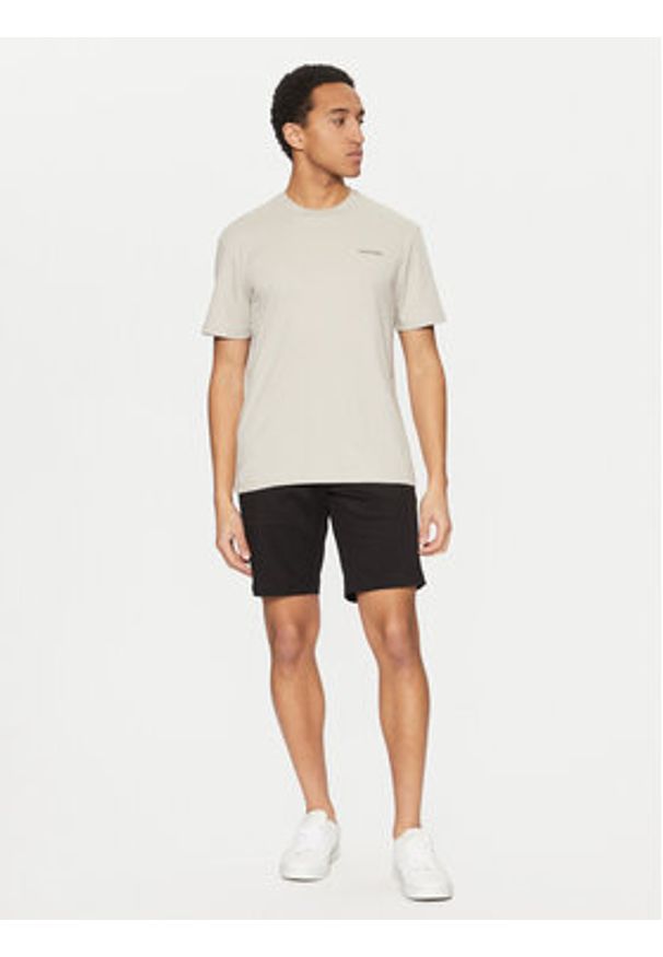 Calvin Klein T-Shirt Micro Logo K10K109894 Beżowy Regular Fit. Kolor: beżowy. Materiał: bawełna