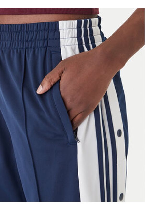 Adidas - adidas Spodnie dresowe Adibreak KD6325 Granatowy Loose Fit. Kolor: niebieski. Materiał: syntetyk