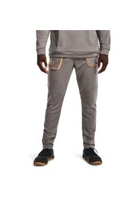 Spodnie Under Armour Terry Evolution, Mężczyźni. Kolor: szary, pomarańczowy, wielokolorowy. Materiał: poliester, materiał. Sport: taniec, joga i pilates