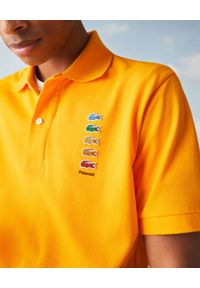 Lacoste - LACOSTE - Żółta koszulka polo z logo Regular Fit. Typ kołnierza: polo. Kolor: żółty. Materiał: bawełna. Wzór: haft, prążki, aplikacja #2