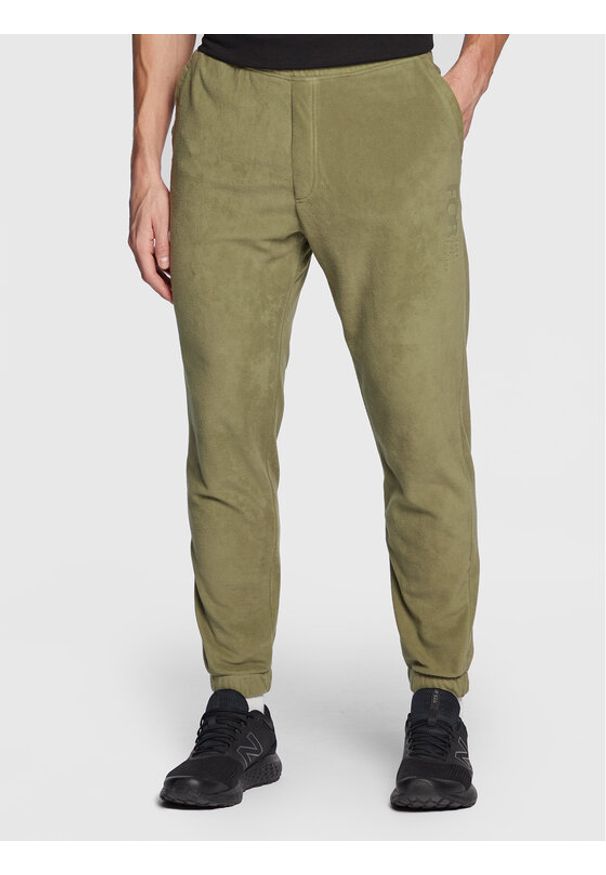 4f - Spodnie dresowe 4F. Kolor: zielony. Materiał: dresówka