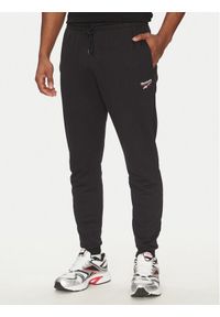 Reebok Spodnie dresowe 100221800 139-18-00 Czarny Regular Fit. Kolor: czarny. Materiał: bawełna #1