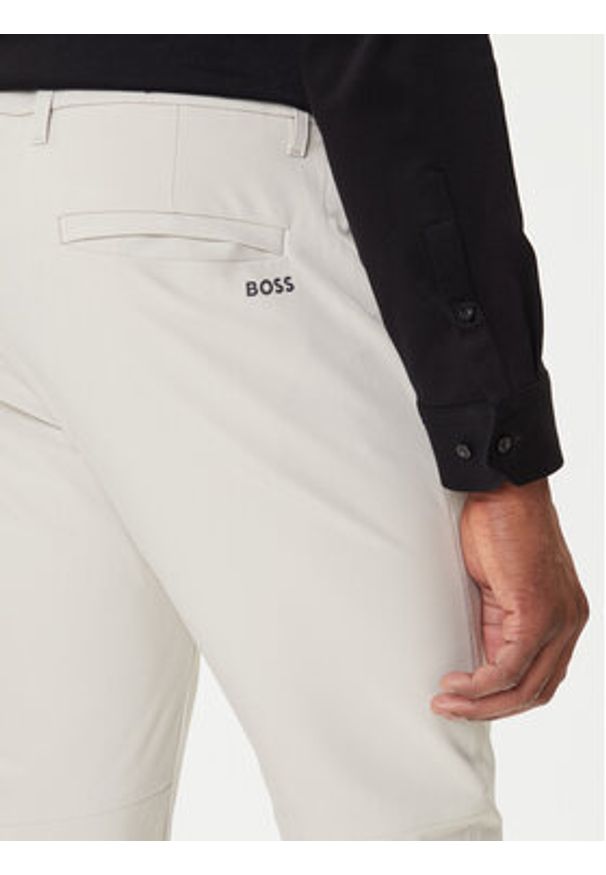BOSS Spodnie materiałowe T_Commuter 50534303 Beżowy Slim Fit. Kolor: beżowy. Materiał: syntetyk