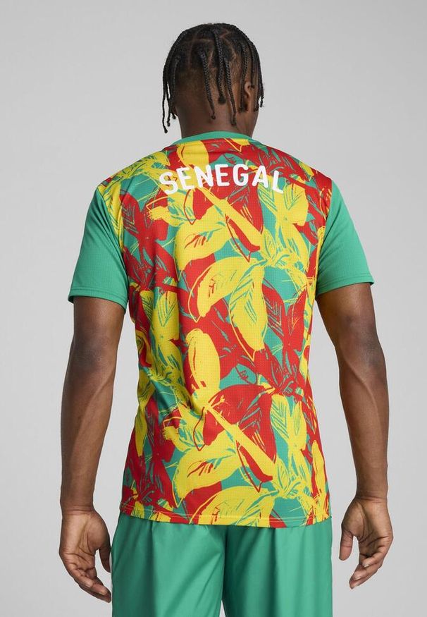 Puma - Koszulka przedmeczowa Sénégal CAN 2025. Kolor: czerwony, zielony, żółty, wielokolorowy