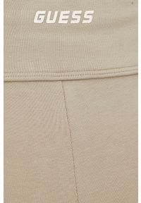 Guess legginsy damskie kolor beżowy z nadrukiem. Stan: podwyższony. Kolor: beżowy. Wzór: nadruk #4