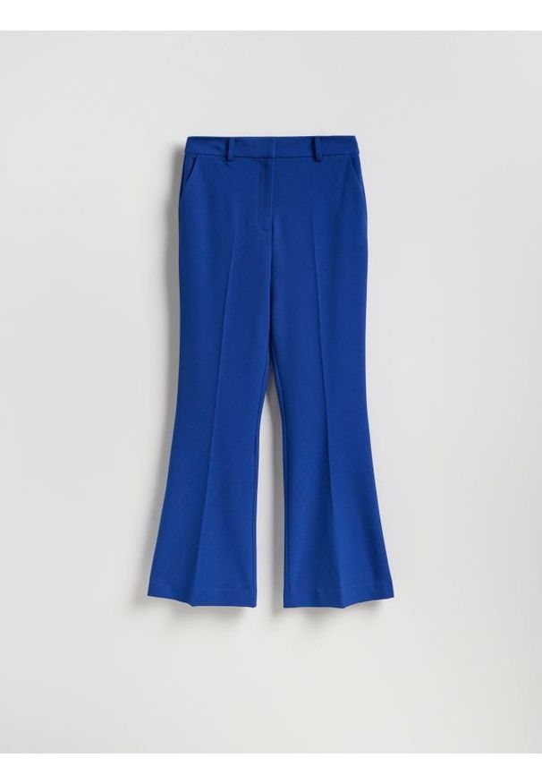 Reserved - Spodnie flare z kantem - niebieski. Kolor: niebieski. Materiał: tkanina, wiskoza