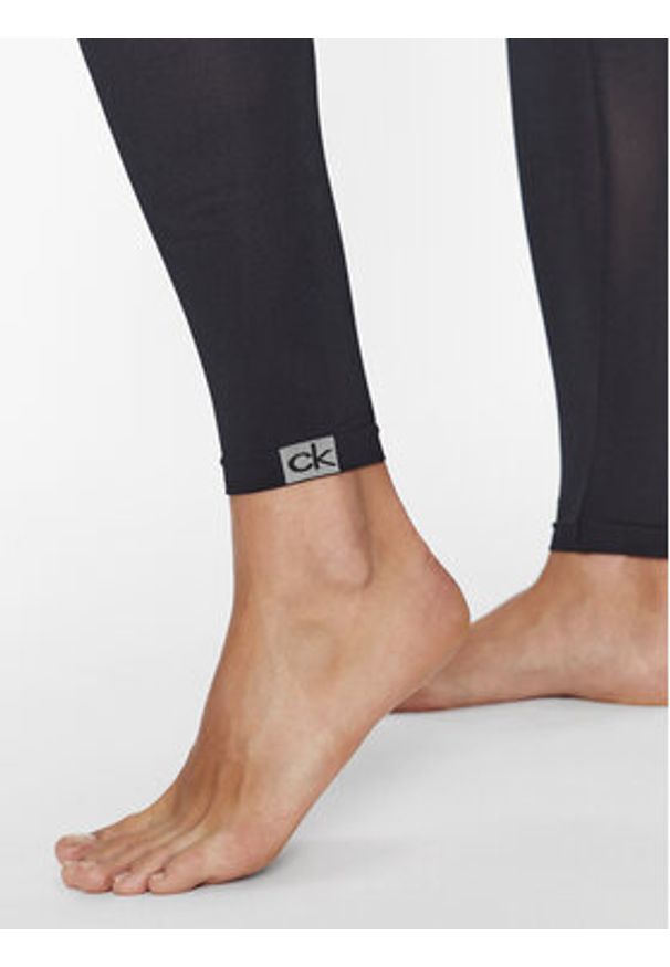 Calvin Klein Legginsy 701226028 Czarny Slim Fit. Kolor: czarny. Materiał: syntetyk