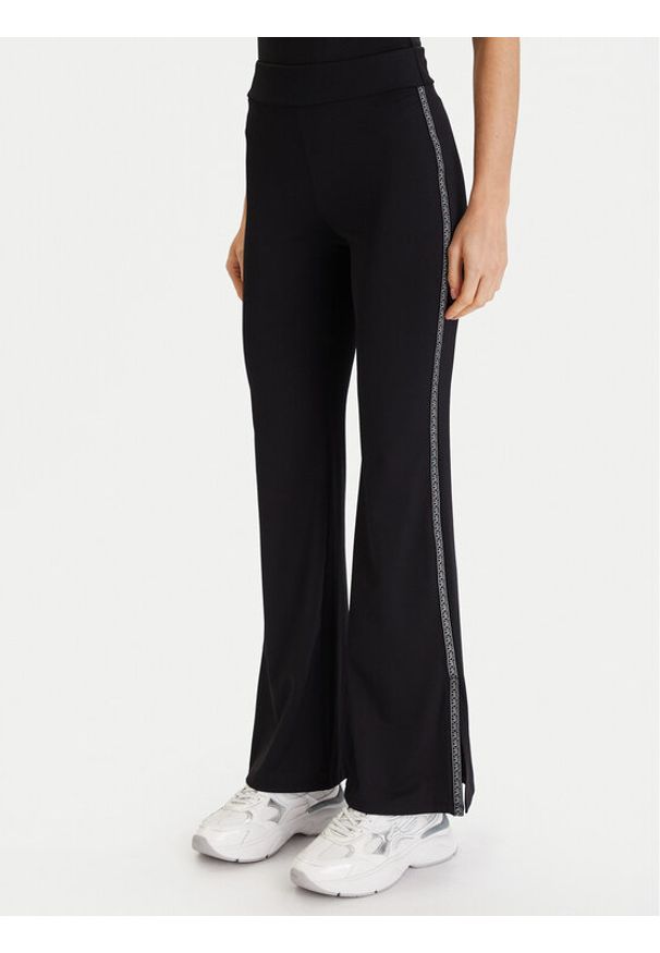 MICHAEL Michael Kors Legginsy MF530W51RE Czarny Flare Fit. Kolor: czarny. Materiał: syntetyk