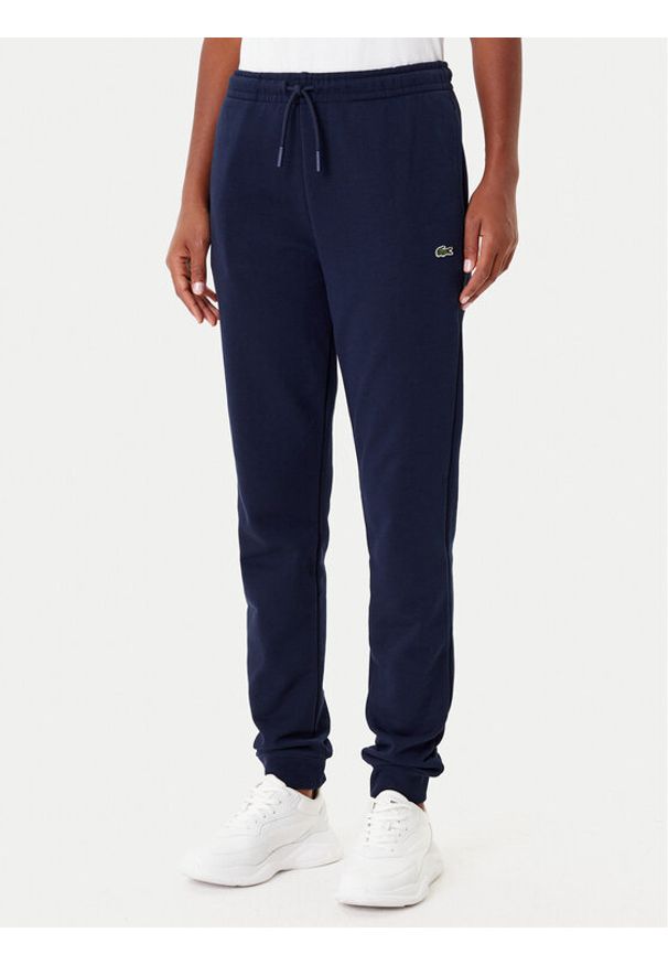 Lacoste Spodnie dresowe XF9216 Granatowy Regular Fit. Kolor: niebieski. Materiał: bawełna