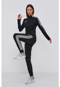 Adidas - adidas Spodnie damskie kolor czarny gładkie. Kolor: czarny. Wzór: gładki