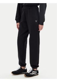 Guess Spodnie dresowe V5YB17 KCRP0 Czarny Regular Fit. Kolor: czarny. Materiał: bawełna #1