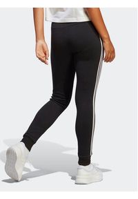 Adidas - adidas Spodnie dresowe Essentials 3-Stripes French Terry Cuffed Joggers IC8770 Czarny Slim Fit. Kolor: czarny. Materiał: bawełna #3