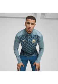 Puma - Męska bluza przedmeczowa z zamkiem 1/4 Olympique Marsylia PUMA. Kolor: niebieski. Długość rękawa: krótki rękaw. Długość: krótkie. Wzór: aplikacja. Sport: piłka nożna