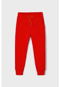 Mayoral spodnie dziecięce kolor czerwony gładkie. Kolor: czerwony. Materiał: dzianina. Wzór: gładki