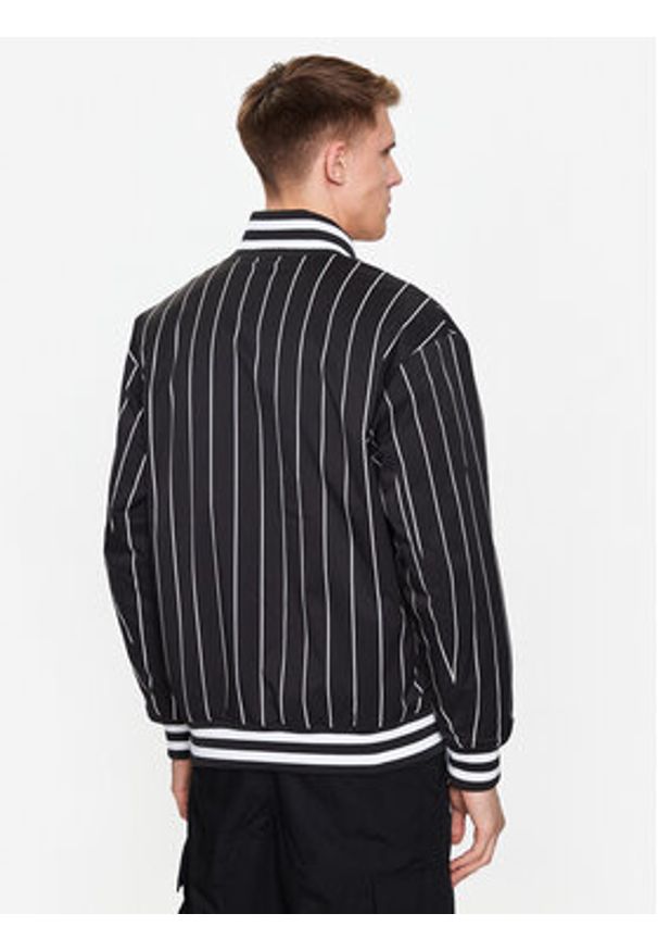 Tommy Jeans Kurtka bomber Pinstripe DM0DM15917 Czarny Relaxed Fit. Kolor: czarny. Materiał: syntetyk