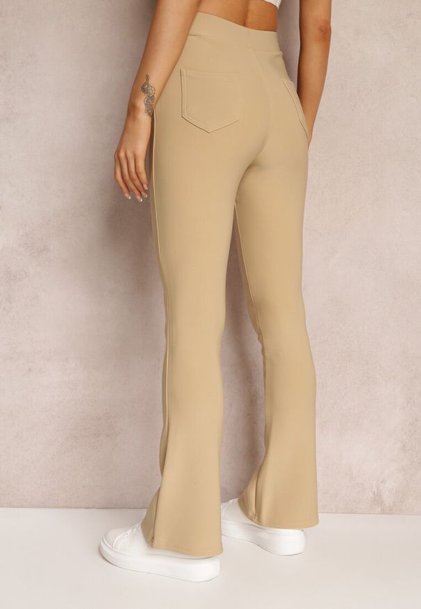 Renee - Beżowe Spodnie Dzwony Fingen. Kolor: beżowy. Materiał: dzianina