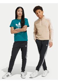 Adidas - adidas Spodnie dresowe Trefoil IY7484 Czarny Regular Fit. Kolor: czarny. Materiał: bawełna