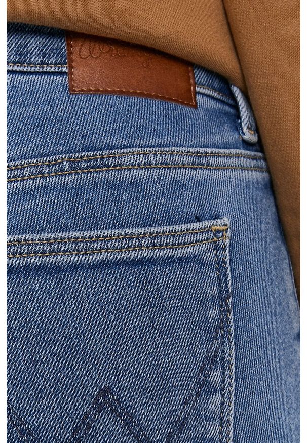 Wrangler - Jeansy. Stan: podwyższony. Kolor: niebieski