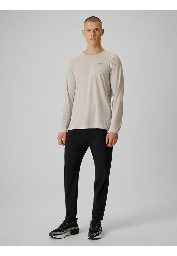 4f - 4F Spodnie do biegania szybkoschnące męskie - czarne M. Kolor: czarny. Materiał: tkanina. Sport: bieganie