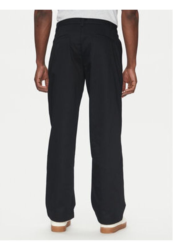 Champion Spodnie materiałowe 220715 Czarny Regular Fit. Kolor: czarny. Materiał: bawełna