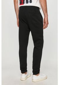 Trussardi Jeans - Spodnie. Kolor: czarny. Materiał: bawełna, dzianina, elastan. Wzór: aplikacja #3