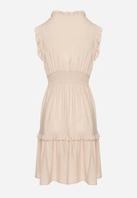 Born2be - Beżowa Sukienka z Wiskozą o Rozkloszowanym Kroju Bez Rękawów Folerose. Typ kołnierza: dekolt w serek. Kolor: beżowy. Materiał: wiskoza. Długość rękawa: bez rękawów. Sezon: wiosna, lato. Typ sukienki: rozkloszowane. Styl: elegancki #6