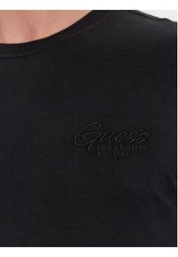 Guess T-Shirt Ss Cn Treated M4RI49 KBL31 Czarny Slim Fit. Kolor: czarny. Materiał: bawełna