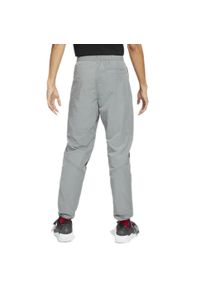 Nike - Spodnie męskie nike air jordan flight suit pants smoke grey. Kolor: szary, czarny, wielokolorowy. Model: Nike Air Jordan. Sport: bieganie #2