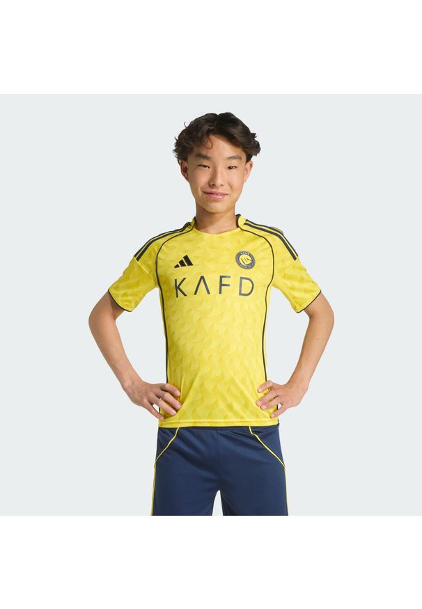Adidas - Dziecięca koszulka podstawowa Al Nassr FC 25/26. Kolor: wielokolorowy, niebieski, żółty. Sport: piłka nożna