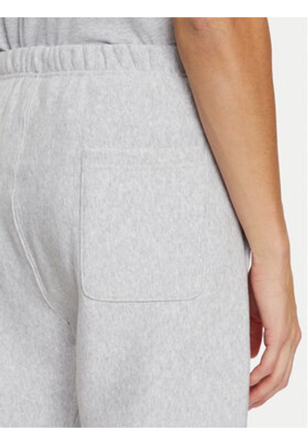Champion Spodnie dresowe 220709 Szary Relaxed Fit. Kolor: szary. Materiał: bawełna